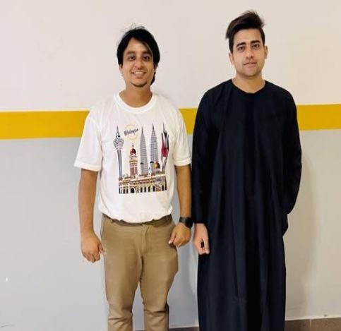 Trainer standing beside a network engineer in Kuala Lumpur