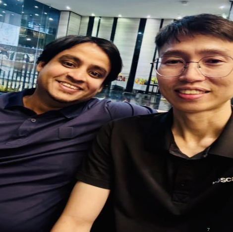 Trainer smiling in a selfie with a fellow network professional